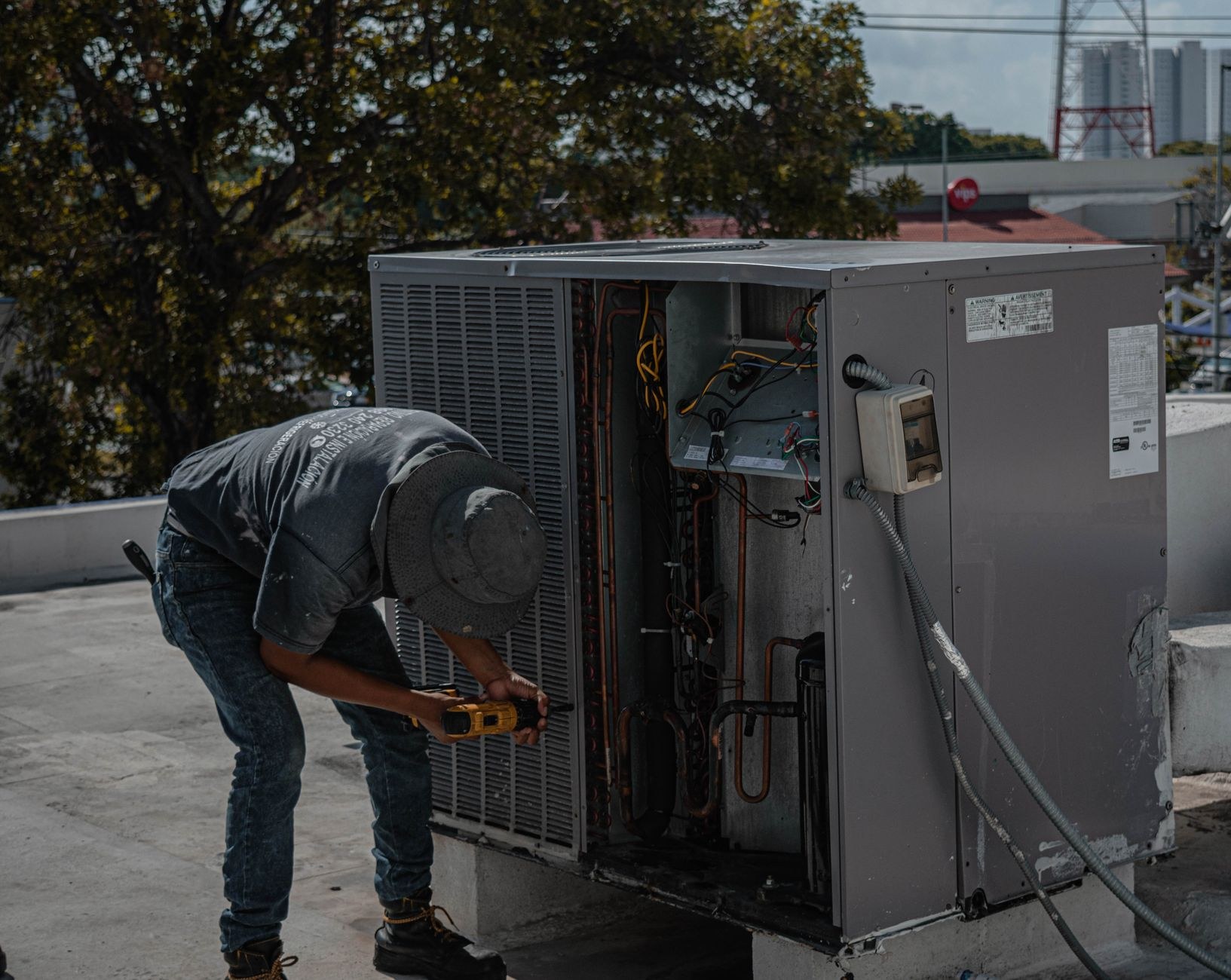 A friendly Happy Air technician on the job in Auckland
